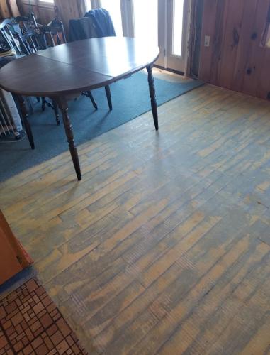 Removing carpet to be able to refinish flooring