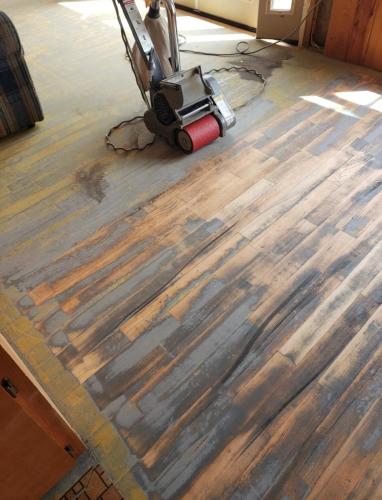Removing carpet to be able to refinish flooring